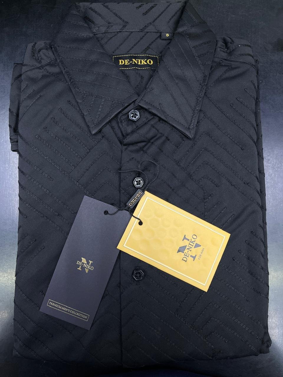 Camisa
